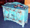 Santa Fe cabinet with sunburst backsplash, antique blue