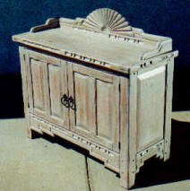 Santa Fe Cabinet With Rosette On Backsplash